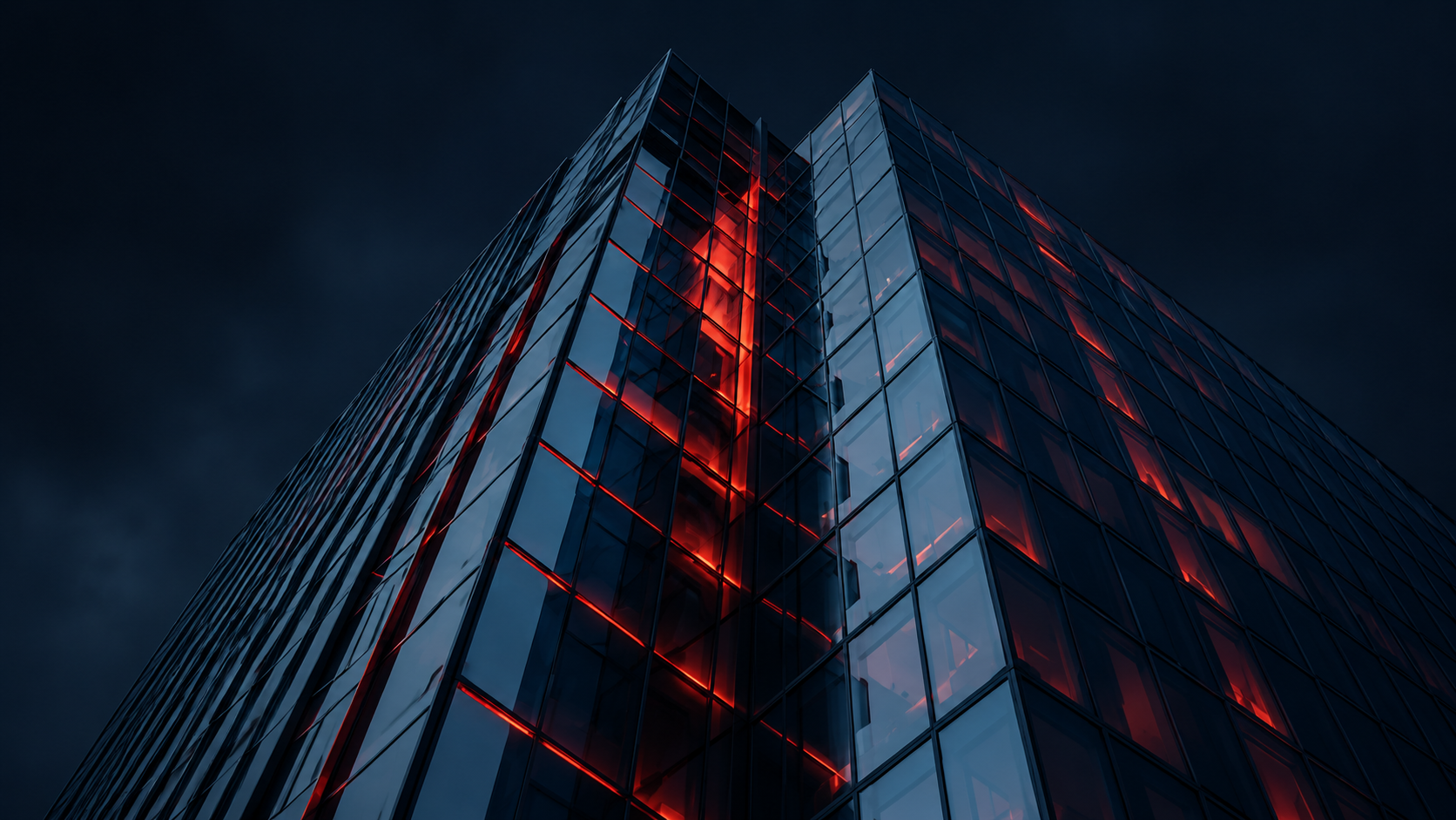 Edificio corporativo moderno con iluminación roja